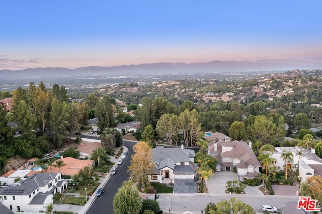 view of aerial view at dusk