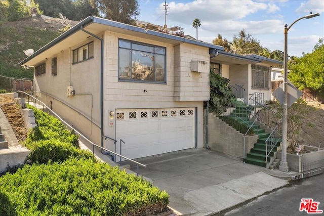 view of front of house with a garage