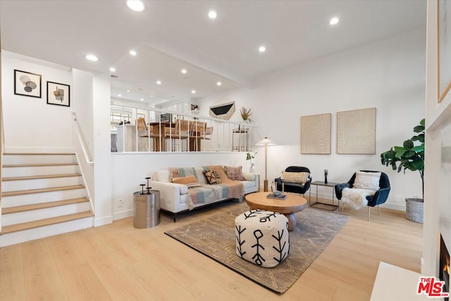 living room with light hardwood / wood-style floors