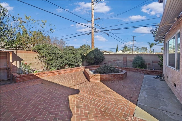 view of patio with a fenced backyard