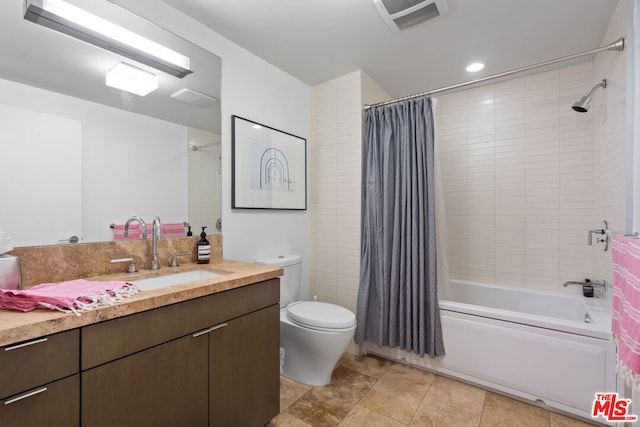 full bathroom with vanity, toilet, and shower / bath combination with curtain