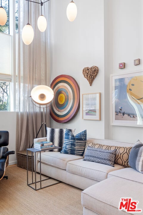 living room featuring light colored carpet