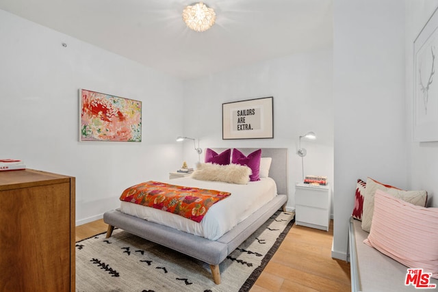 bedroom featuring light hardwood / wood-style floors