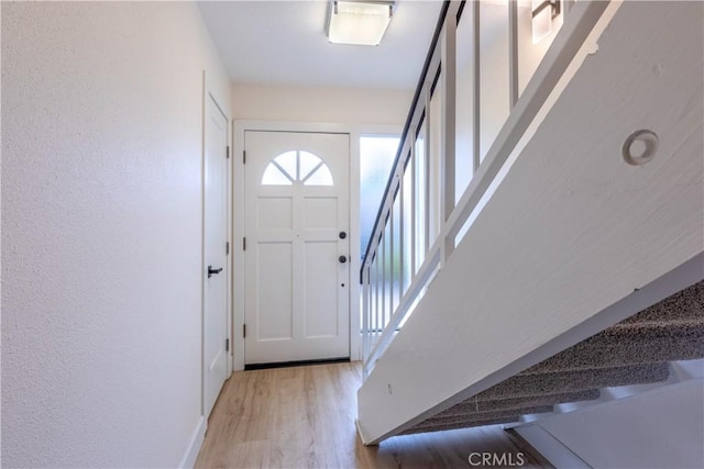 entrance foyer with light wood-type flooring