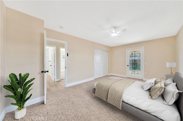 bedroom featuring light carpet, baseboards, a closet, and a ceiling fan