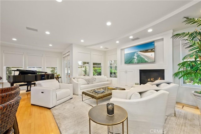 living room with light hardwood / wood-style floors