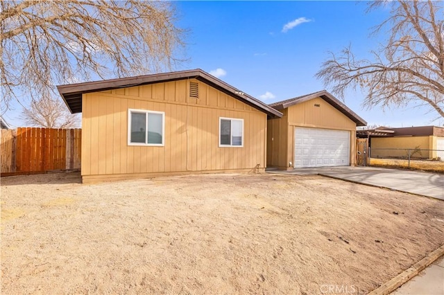 ranch-style home featuring a garage