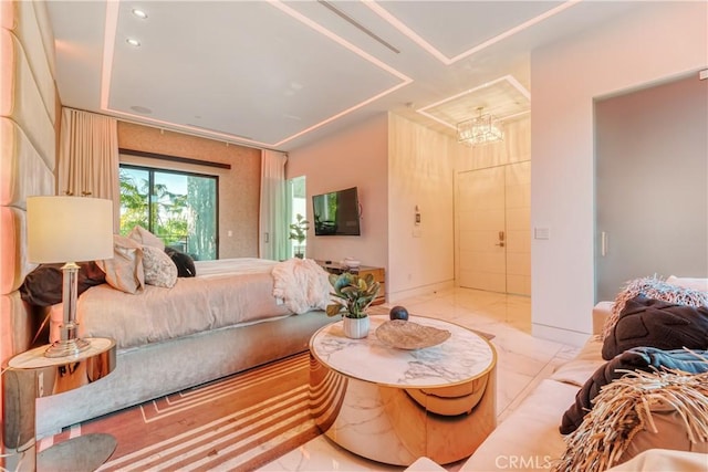 bedroom featuring an inviting chandelier