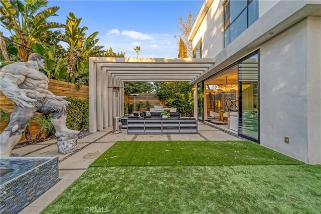 view of yard with an outdoor living space, a patio area, fence, and a pergola