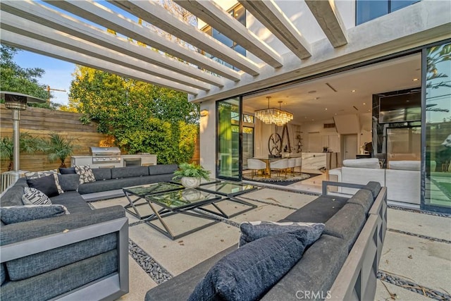 view of patio with fence, an outdoor living space, exterior kitchen, a pergola, and grilling area