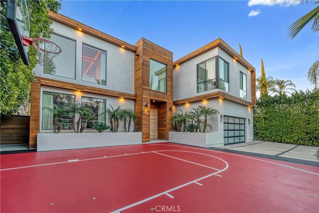 view of basketball court featuring basketball hoop