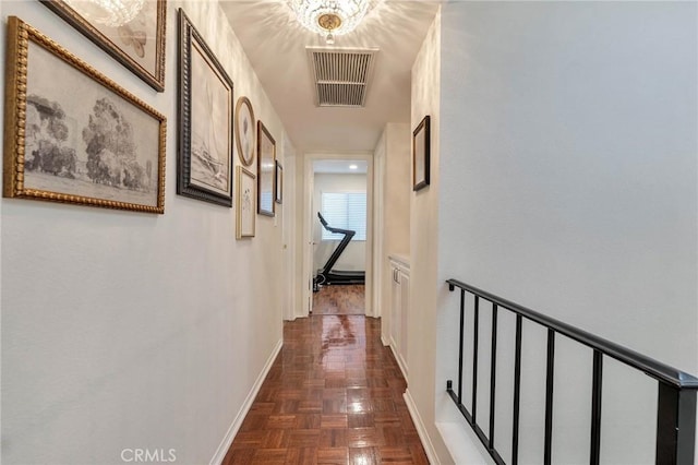 corridor with dark parquet flooring