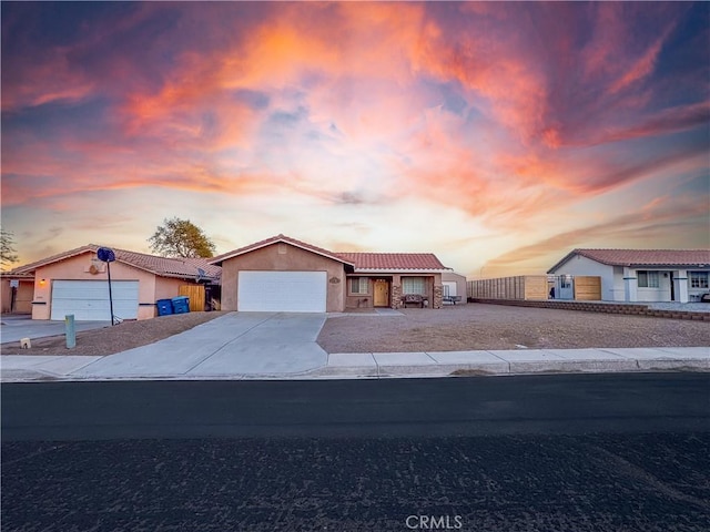 view of front of home with a garage