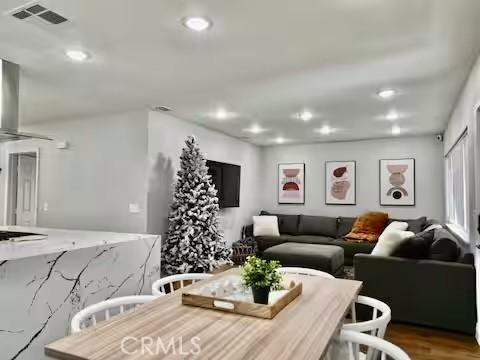 living room with hardwood / wood-style flooring