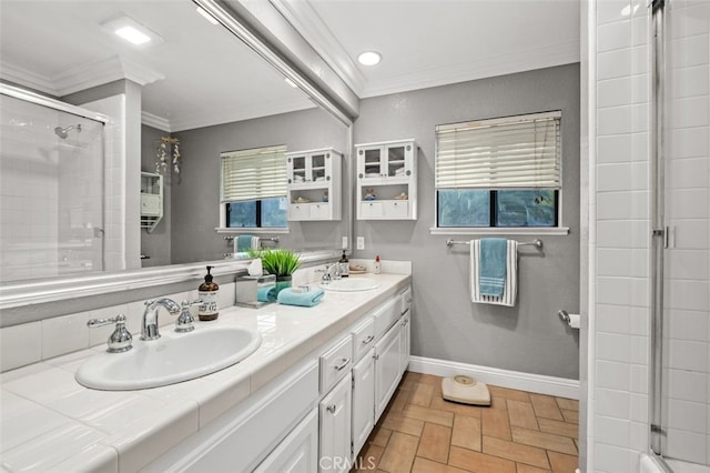 bathroom featuring crown molding, vanity, and an enclosed shower