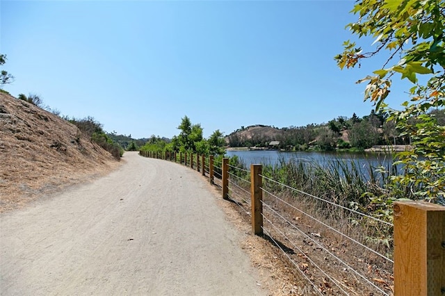 view of street with a water view