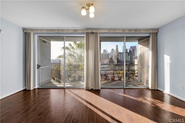 doorway to outside with hardwood / wood-style floors