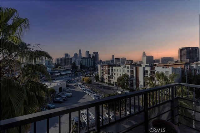 view of balcony at dusk