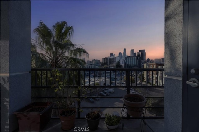 view of balcony at dusk