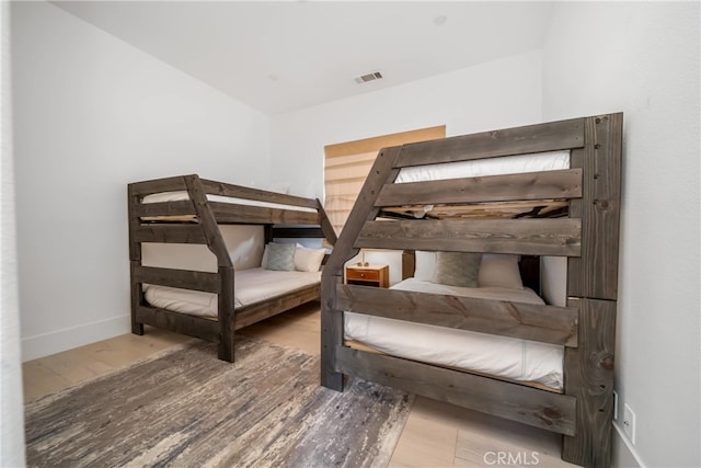 bedroom featuring hardwood / wood-style floors