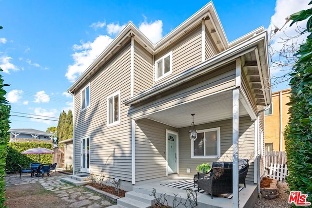 view of front of home with a patio area