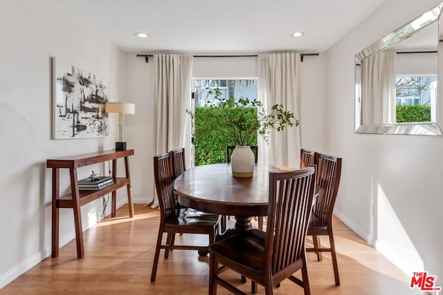 dining room featuring light hardwood / wood-style flooring