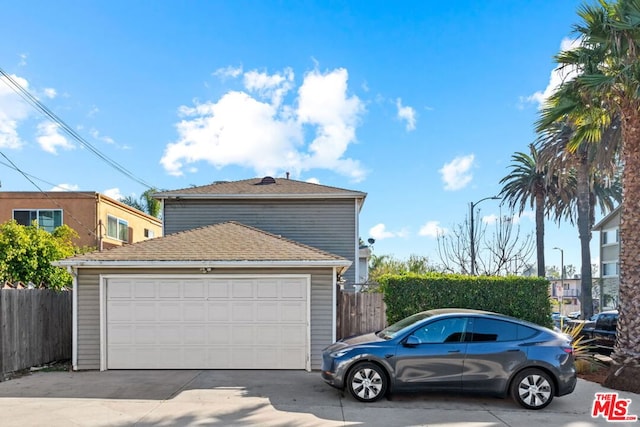 view of property exterior featuring a garage