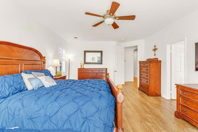 bedroom featuring ceiling fan and light wood-type flooring