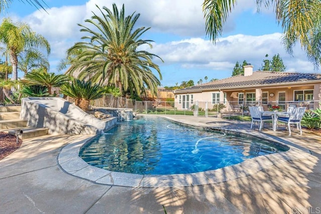 view of pool featuring a patio