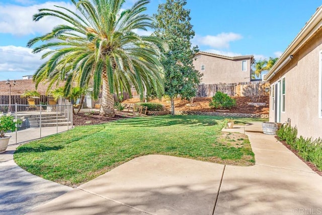 view of yard with a patio area