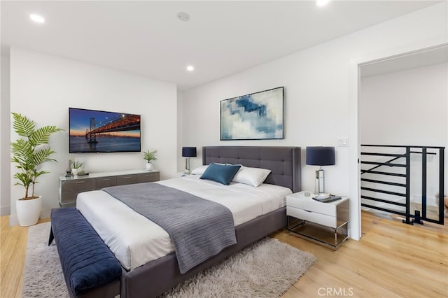 bedroom with light wood-type flooring