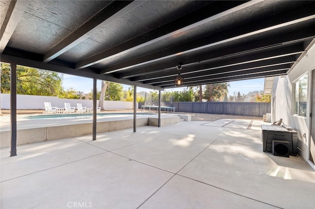 view of patio / terrace featuring a fenced in pool