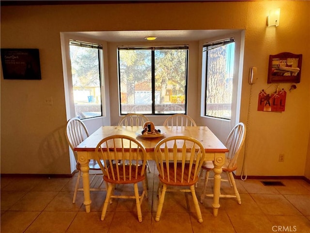 view of tiled dining room