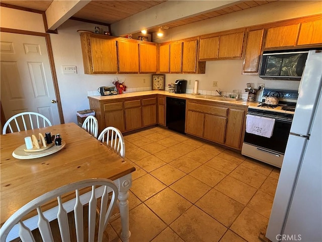 kitchen with sink, beam ceiling, light tile patterned floors, wood ceiling, and white appliances