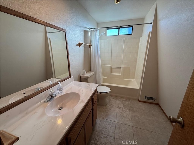 full bathroom featuring toilet, vanity, and shower / bathtub combination with curtain