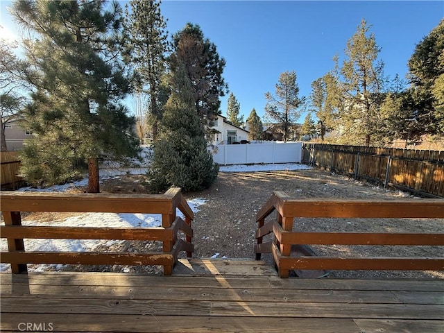 view of yard featuring a wooden deck