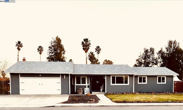 single story home featuring a garage