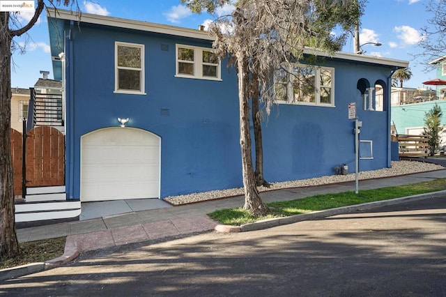 view of front of home featuring a garage