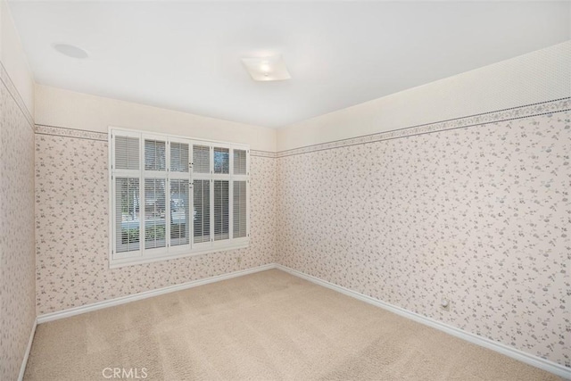 view of carpeted spare room