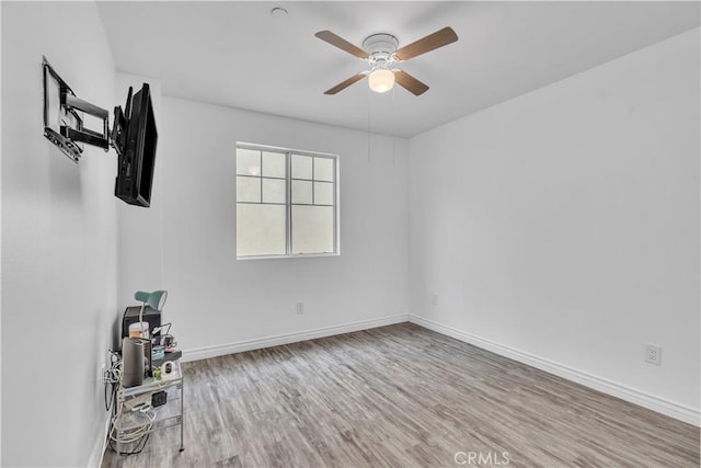 8856 Burnet Ave, North Hills, CA 91343 - empty room with wood finished floors and ceiling fan
