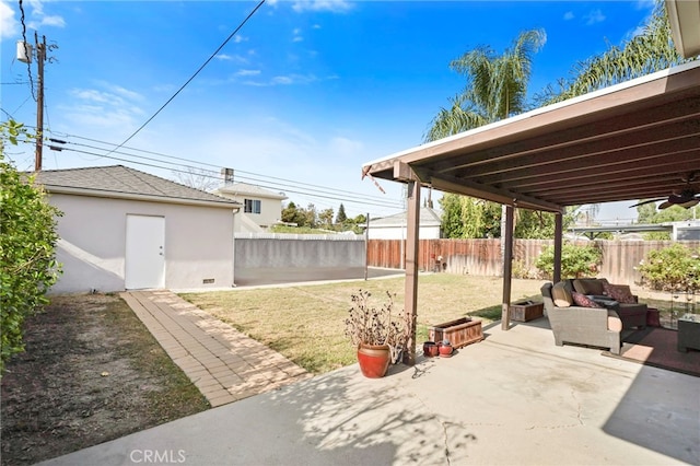 view of patio with an outbuilding and an outdoor hangout area