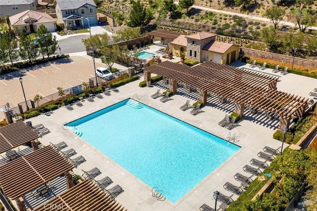 view of pool featuring a pergola and a patio area