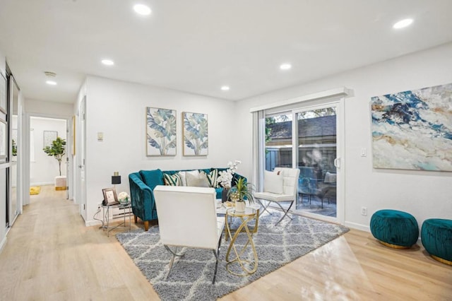 living room with light hardwood / wood-style floors