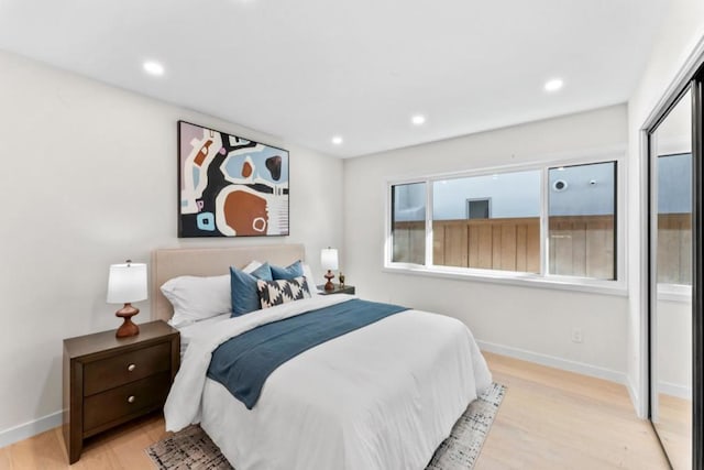 bedroom with light hardwood / wood-style flooring