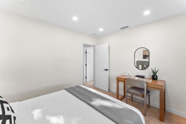 bedroom featuring wood-type flooring