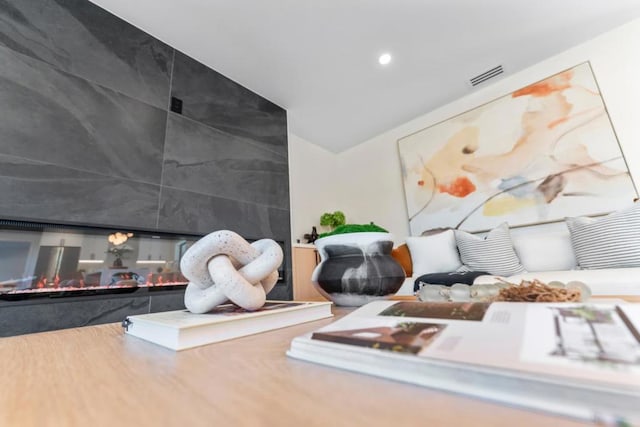 interior space featuring a fireplace and tile walls