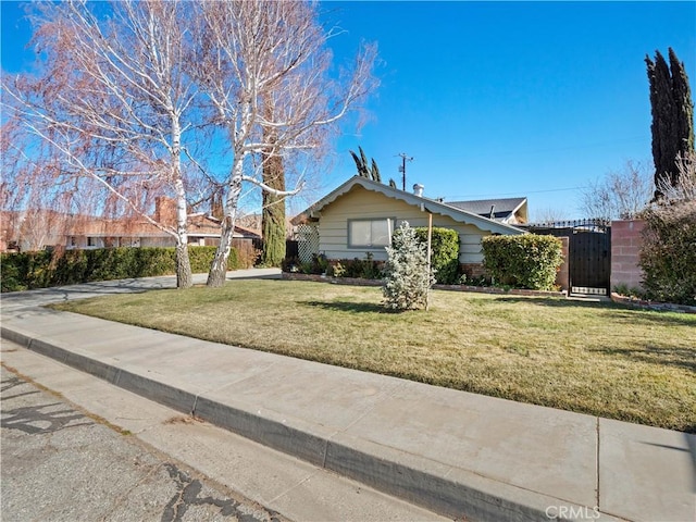 ranch-style house with a front yard