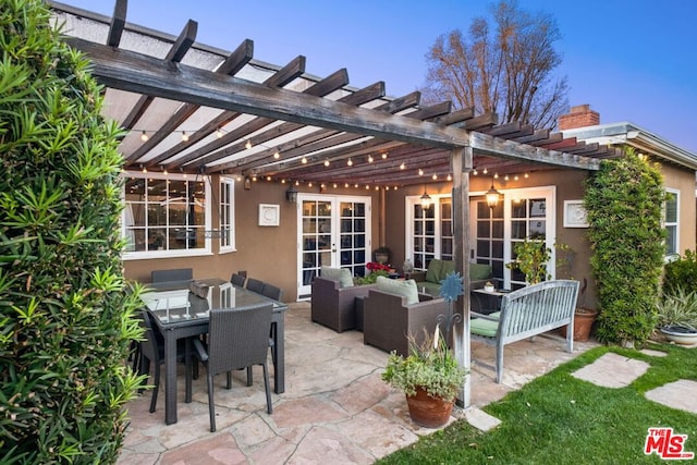 view of patio with french doors, an outdoor hangout area, and a pergola