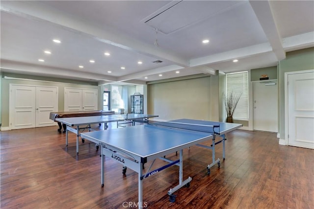 rec room with dark hardwood / wood-style flooring and beamed ceiling