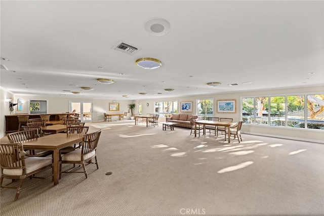 view of carpeted dining area